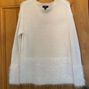 Adorable fuzzy sweater. 🥰